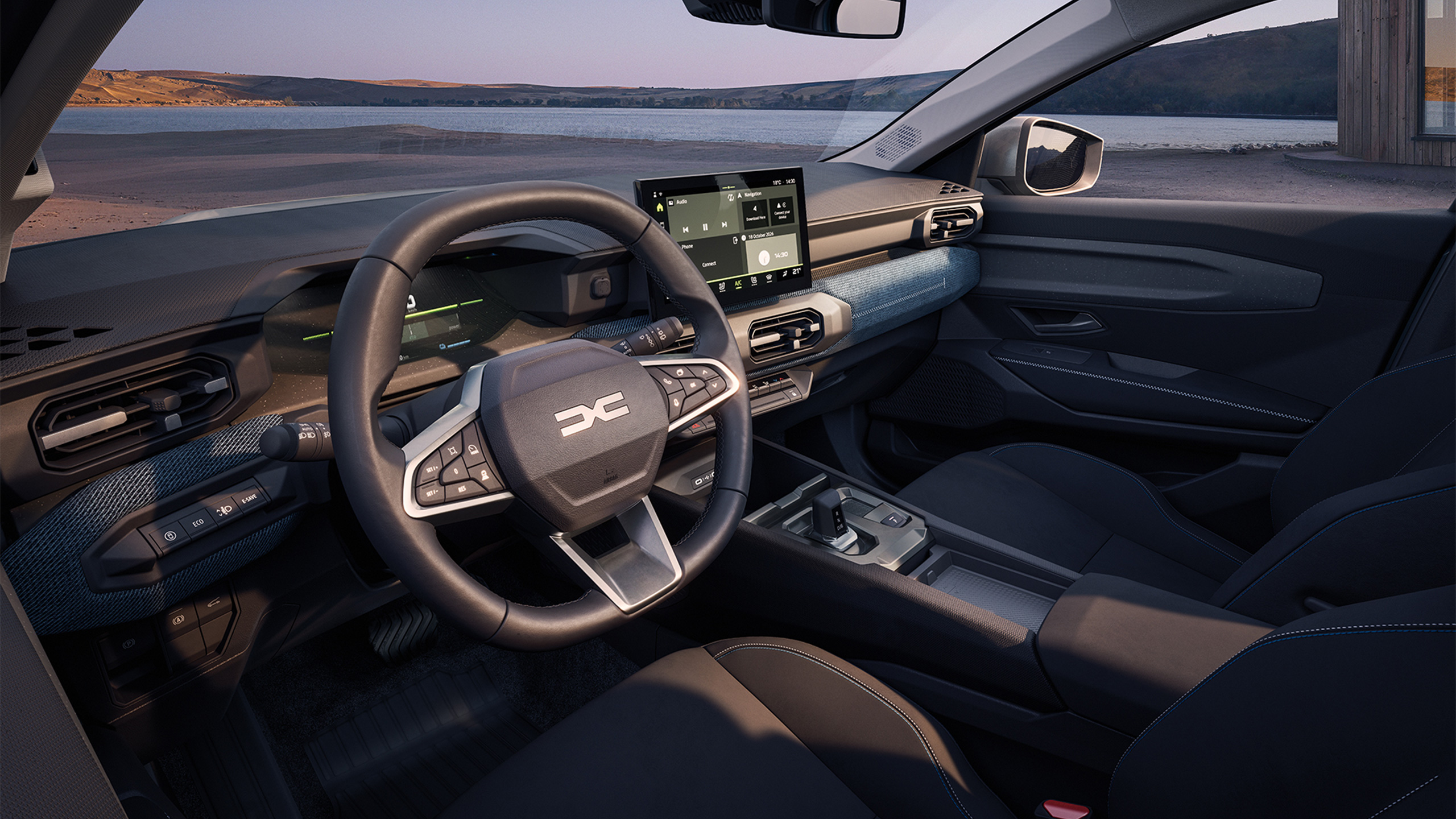 Interiér Dacia Striker s centrální obrazovkou; oficiální vizuál Dacia